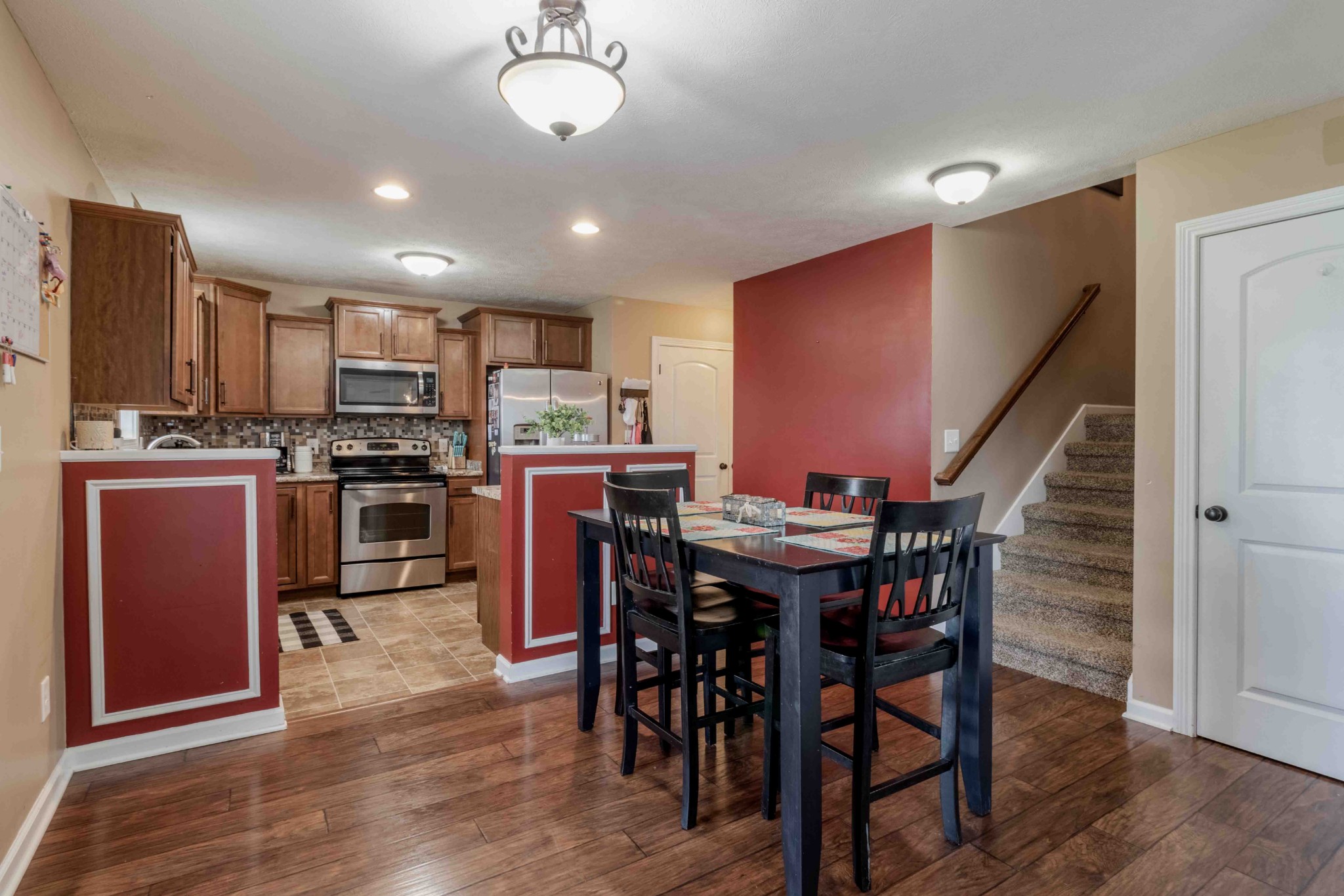 3748 Suiter Road Clarksville, TN 37040 - Photo 8 of 19 a view of a dining room with furniture kitchen and wooden floor