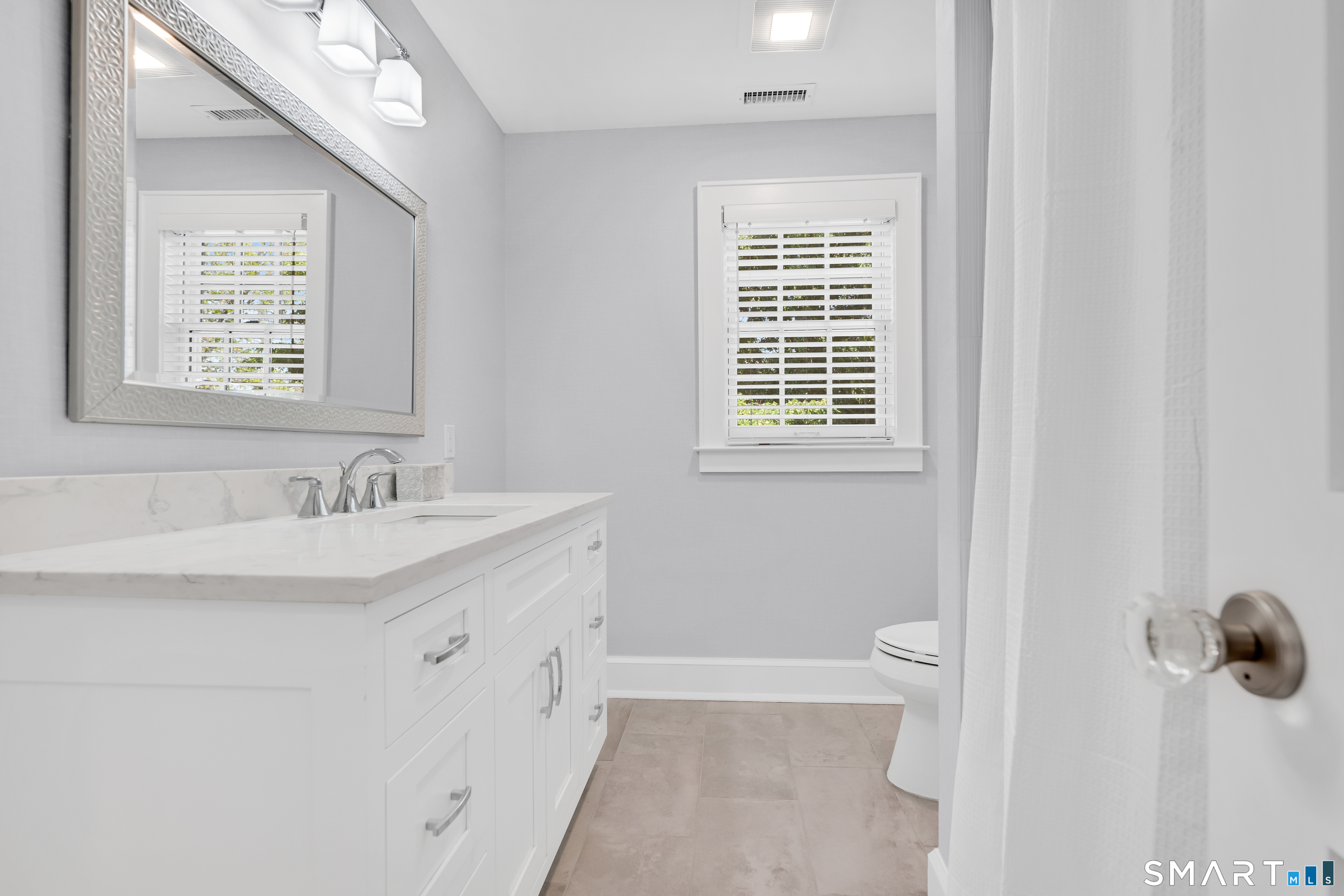 920 Old Post Road Fairfield, CT 06824 - Photo 23 of 40 Beautifully appointed hall bathroom