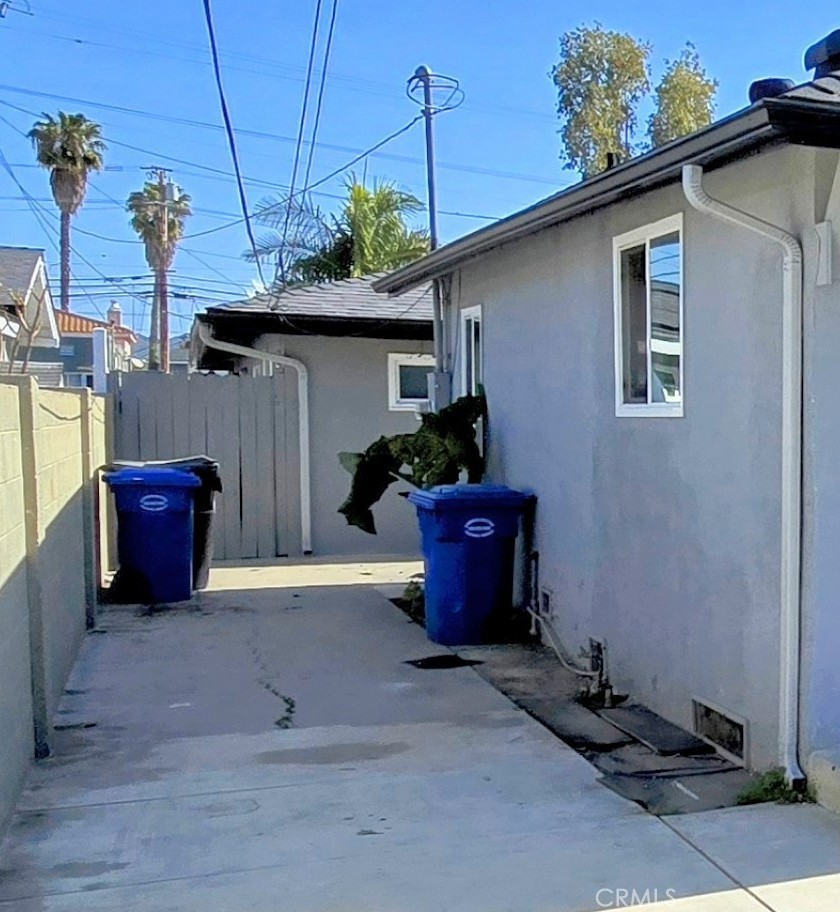 12146 Pine Street, Unit D Norwalk, CA 90650 - Photo 21 of 21 Side yard/patio.