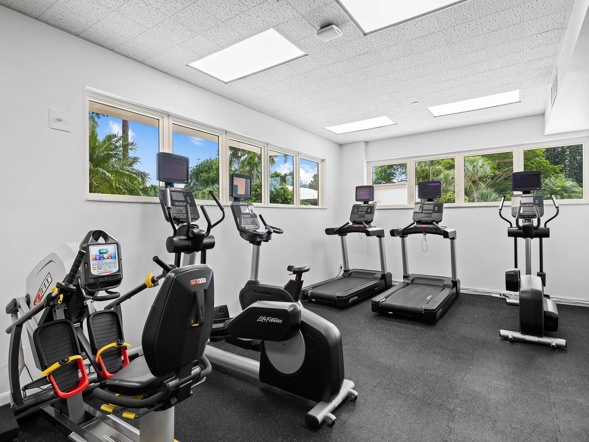 901 East Camino Real, Unit 4D Boca Raton, FL 33432 - Photo 31 of 37 a view of a room with gym equipment