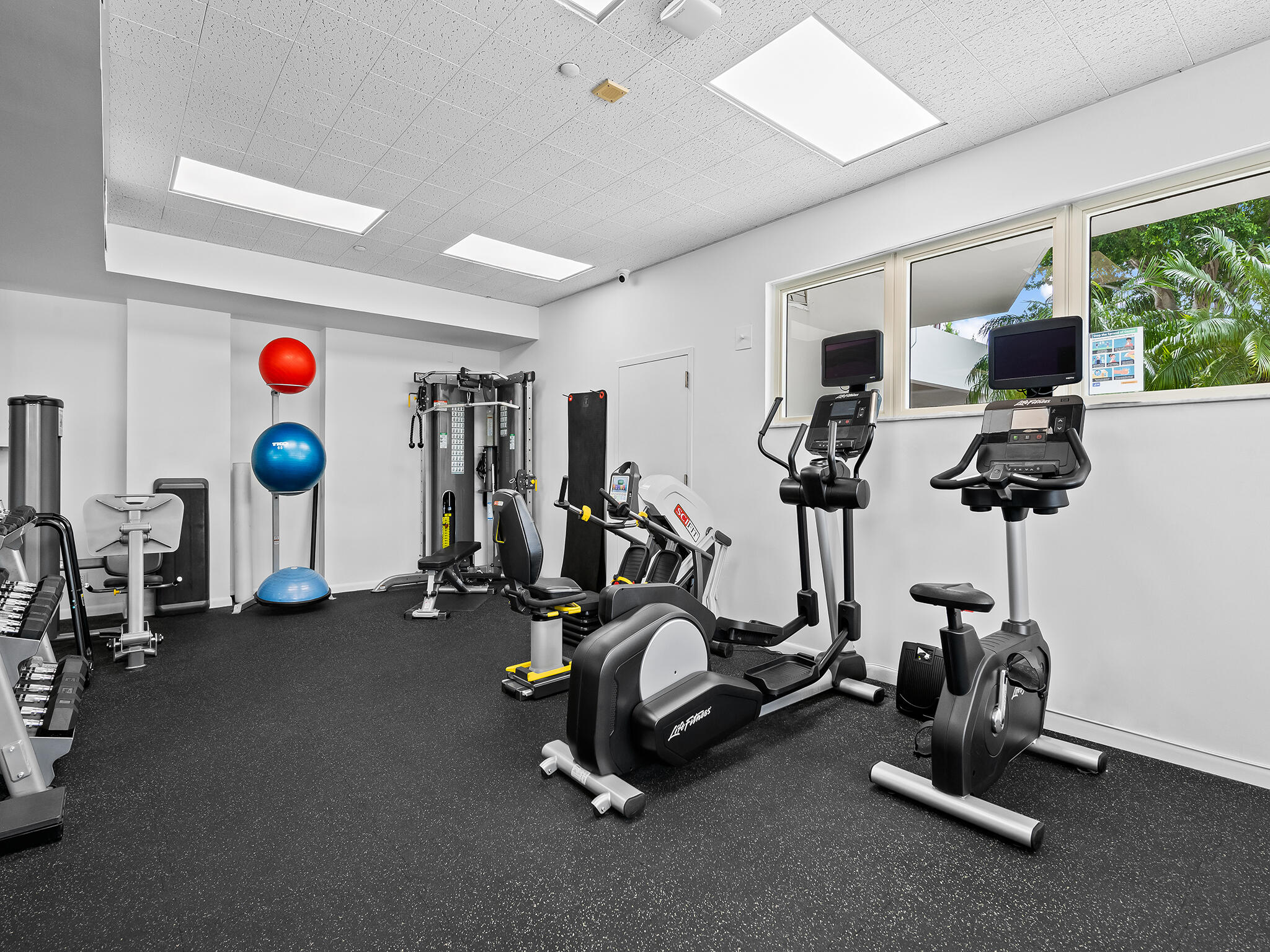 901 East Camino Real, Unit 4D Boca Raton, FL 33432 - Photo 32 of 37 a view of a room with gym equipment