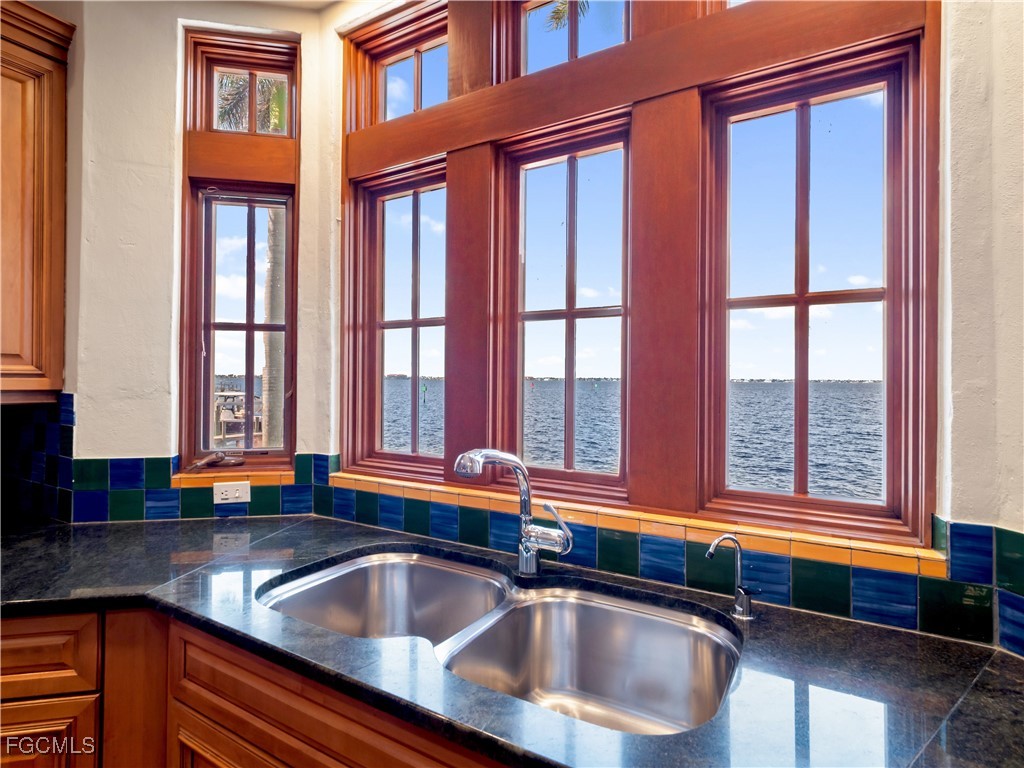 5844 Riverside Lane Fort Myers, FL 33919 - Photo 17 of 50 a kitchen with a sink and a window