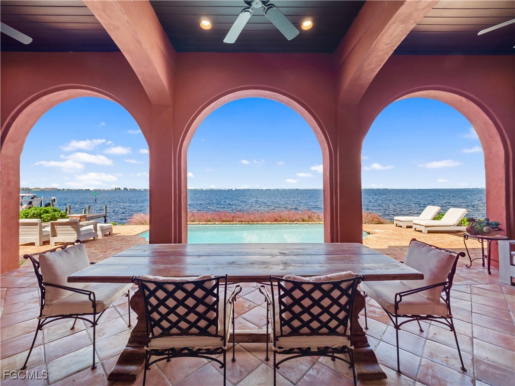 5844 Riverside Lane Fort Myers, FL 33919 - Photo 26 of 50 a view of swimming pool with outdoor seating