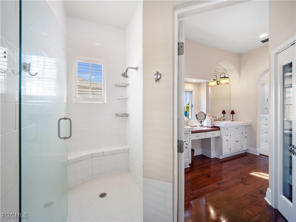 5844 Riverside Lane Fort Myers, FL 33919 - Photo 41 of 50 a bathroom with a sink a shower and a mirror