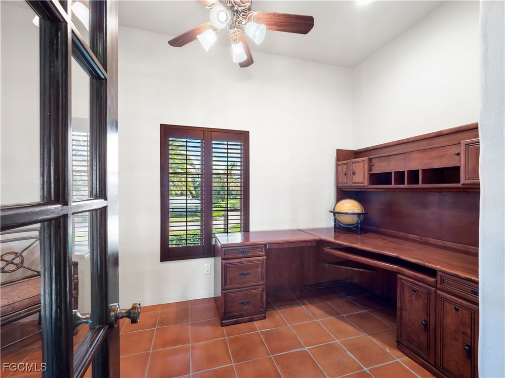 5844 Riverside Lane Fort Myers, FL 33919 - Photo 43 of 50 a kitchen with stainless steel appliances a stove and a refrigerator