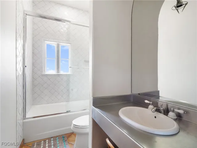 a view of swimming pool with outdoor seating