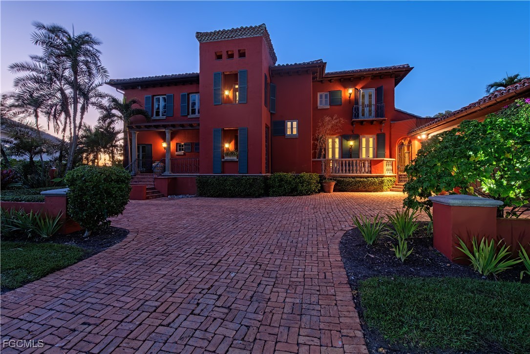 5844 Riverside Lane Fort Myers, FL 33919 - Photo 5 of 50 a front view of a house with garden