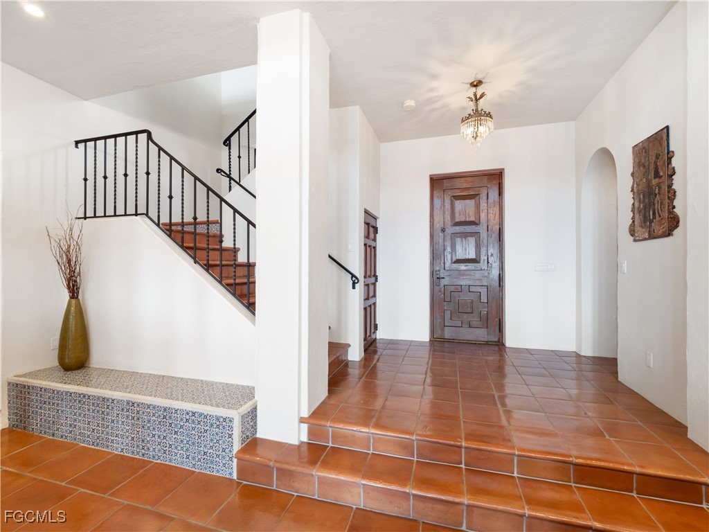 5844 Riverside Lane Fort Myers, FL 33919 - Photo 9 of 50 a view of an entryway with wooden floor