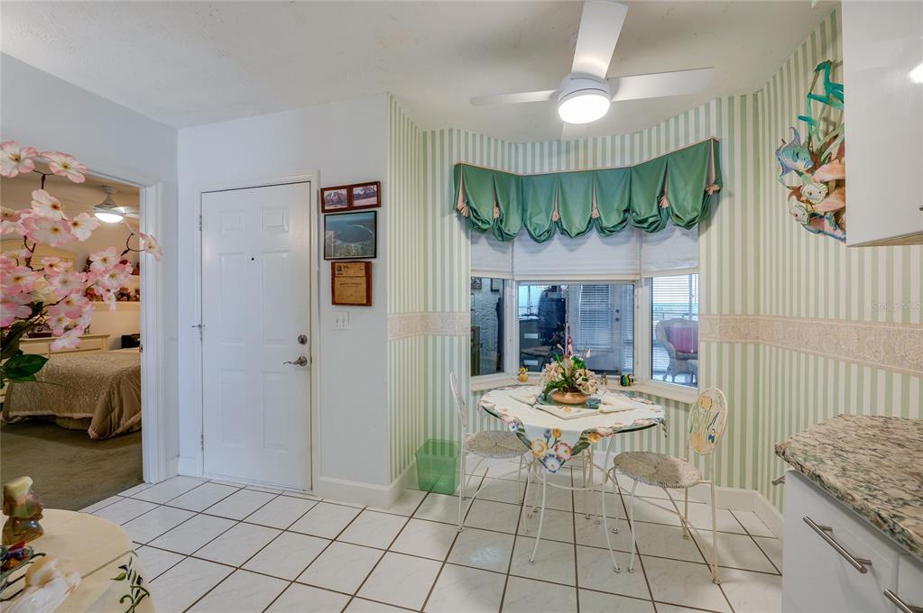 4565 South Atlantic Avenue, Unit 5708 Ponce Inlet, FL 32127 - Photo 11 of 31 a living room with a couch and a table