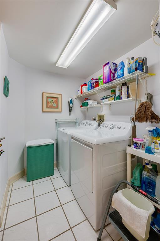 4565 South Atlantic Avenue, Unit 5708 Ponce Inlet, FL 32127 - Photo 24 of 31 a utility room with a window dryer and washer