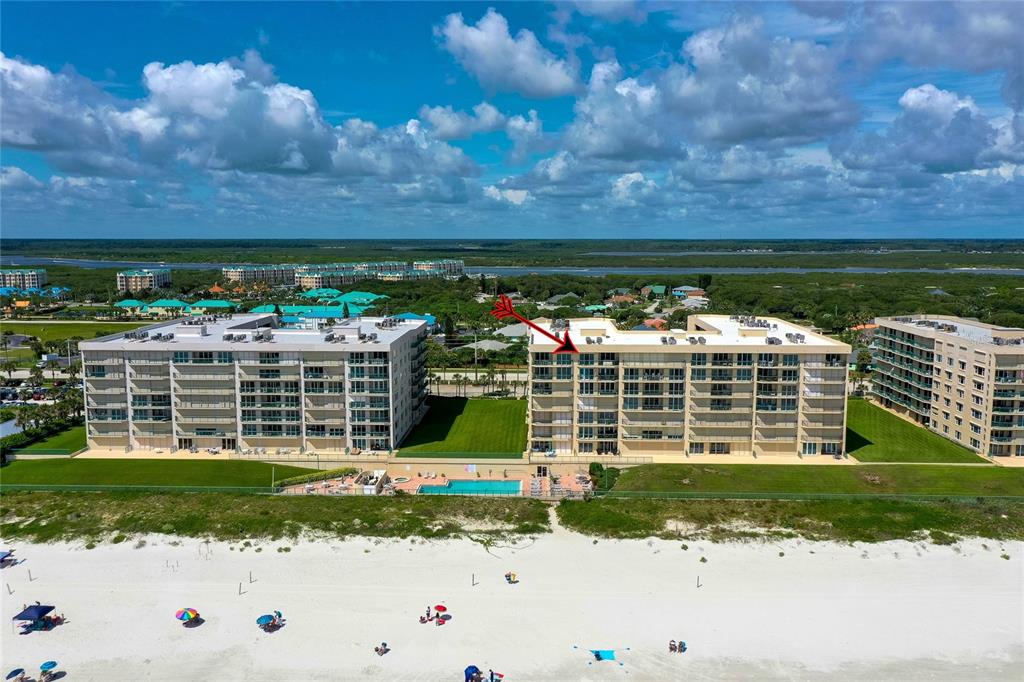 4565 South Atlantic Avenue, Unit 5708 Ponce Inlet, FL 32127 - Photo 30 of 31 a front view of a house with a yard