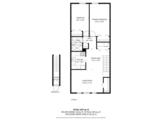 a view of a brick building next to a yard