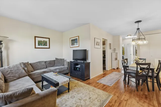 a picture of a bench in front of a wall