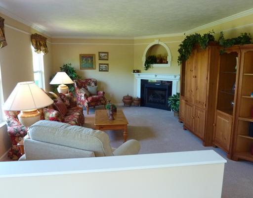 135 Walnut Drive McKees Rocks, PA 15136 - Photo 6 of 18 Den/Family/Great Room. The family room has an abundance of natural light streaming in, cozy gas log fireplace with a decorative mantle above. So come in, sit down and relax for awhile!