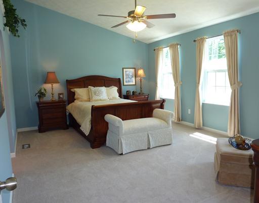 135 Walnut Drive McKees Rocks, PA 15136 - Photo 9 of 18 Master Bedroom. The over sized master suite has vaulted ceilings, large overhead paddle fan, his and her walk-in closets, jet tub, separate shower area and a large vanity plus enough room for a reading area.