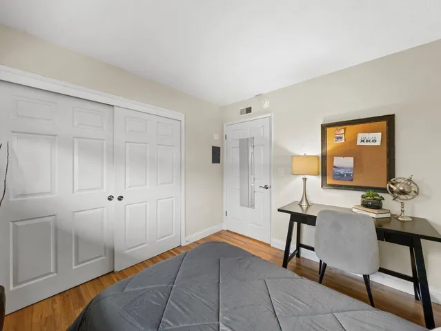 a view of a livingroom with furniture and front door