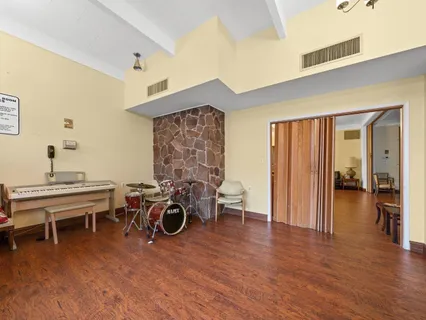 a livingroom with furniture and wooden floor