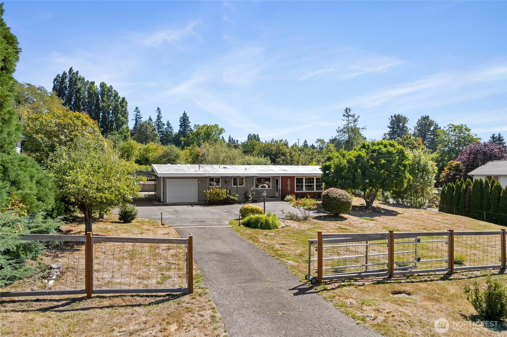 2810 Rickey Road Bremerton, WA 98310 - Photo 2 of 36 a view of a house with backyard and sitting area
