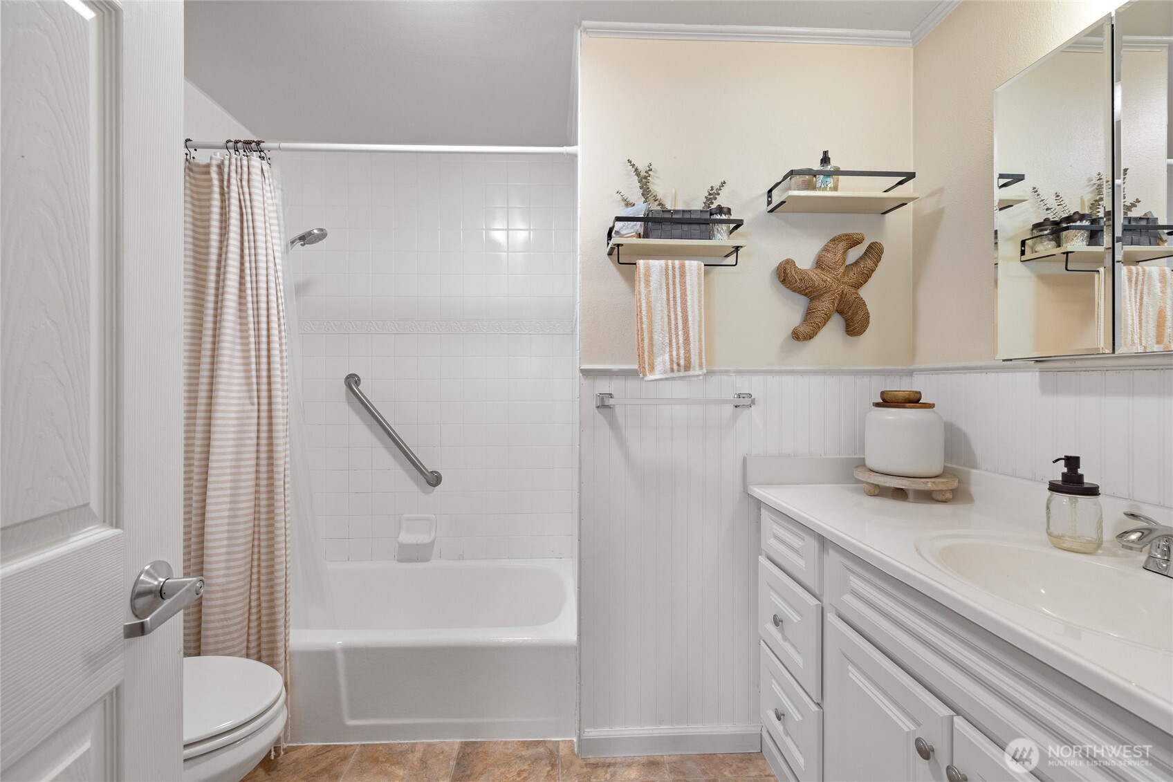 2810 Rickey Road Bremerton, WA 98310 - Photo 23 of 36 a bathroom with a sink mirror vanity and toilet