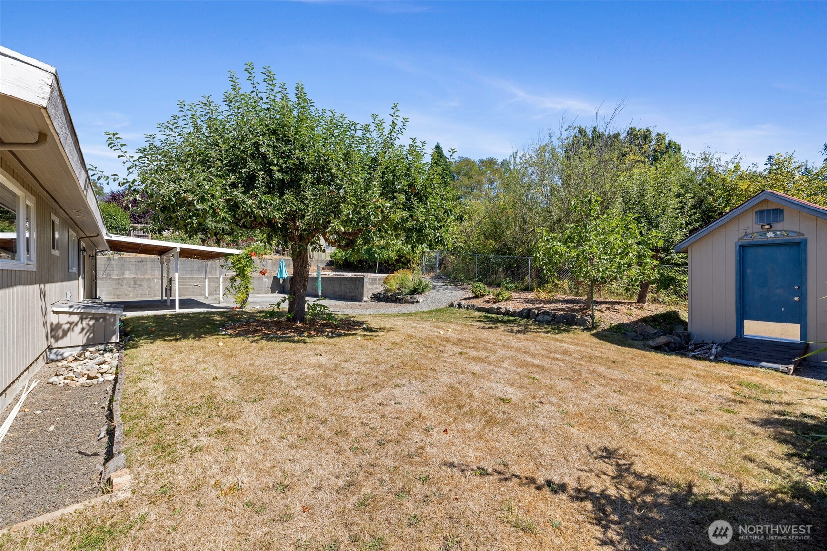 2810 Rickey Road Bremerton, WA 98310 - Photo 28 of 36 a view of a house with a yard