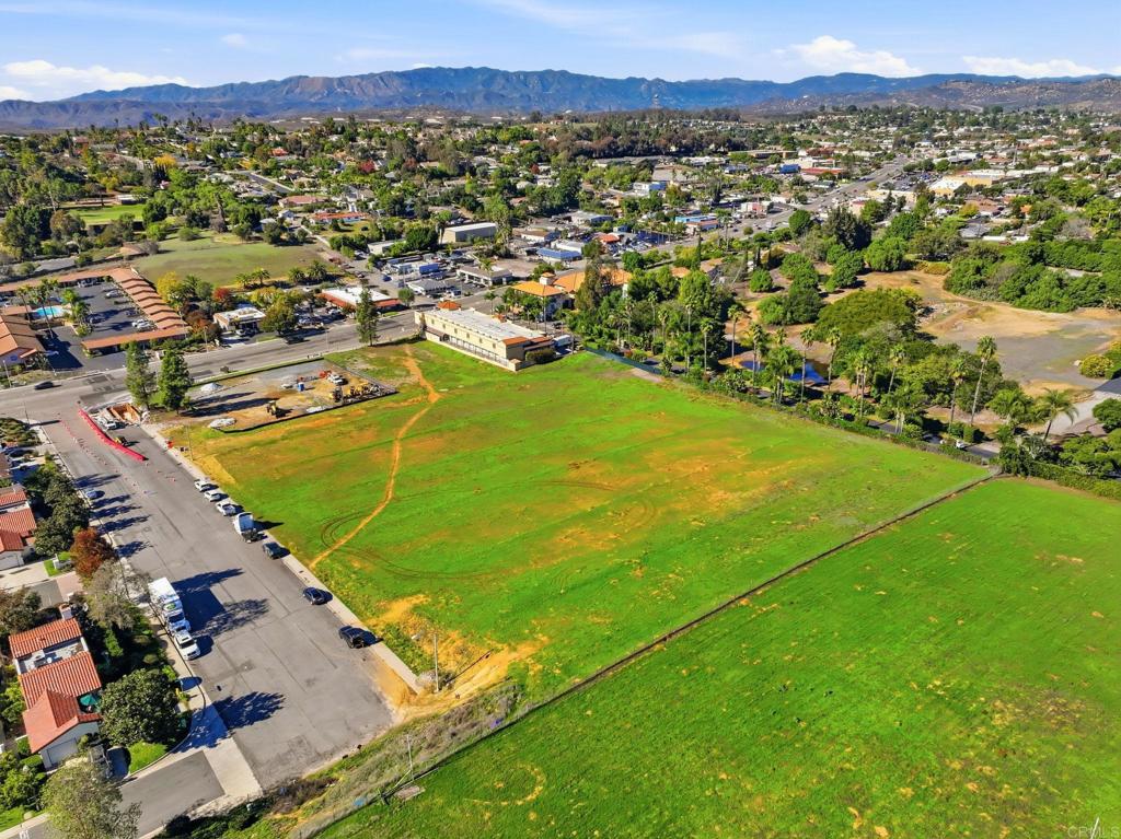 1630 South Mission Road Fallbrook, CA 92028 - Photo 11 of 34 an aerial view of residential houses with outdoor space and trees