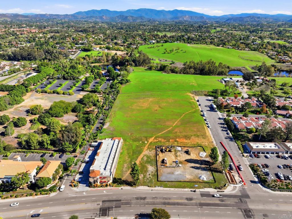 1630 South Mission Road Fallbrook, CA 92028 - Photo 20 of 34 an aerial view of a residential houses and outdoor space