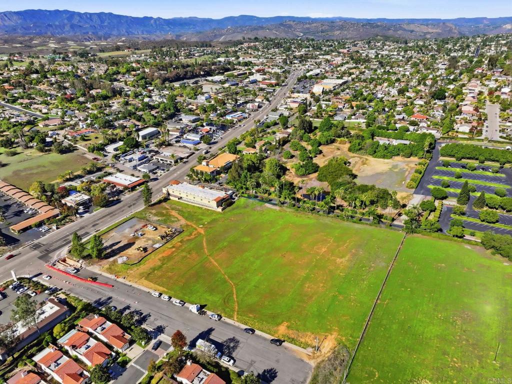 1630 South Mission Road Fallbrook, CA 92028 - Photo 24 of 34 an aerial view of residential houses with outdoor space