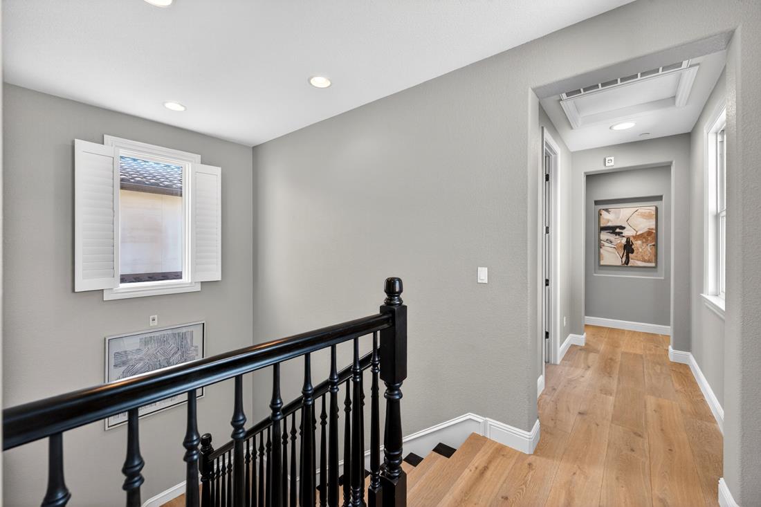 718 Timberpine Avenue Sunnyvale, CA 94086 - Photo 32 of 71 a view of a hallway with wooden floor and a bathroom