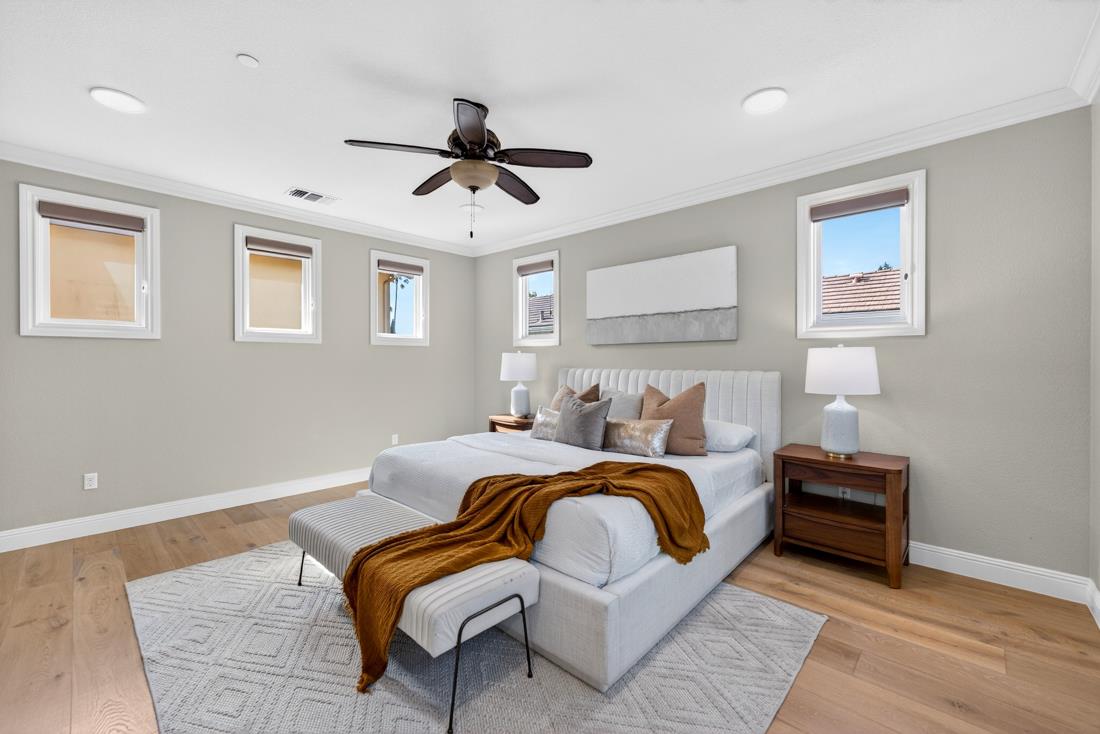 718 Timberpine Avenue Sunnyvale, CA 94086 - Photo 41 of 71 a bedroom with a bed and a chandelier