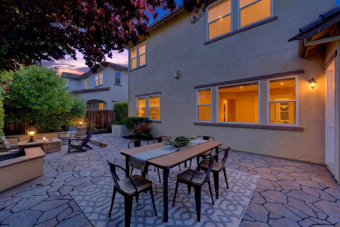 718 Timberpine Avenue Sunnyvale, CA 94086 - Photo 68 of 71 a view of a dinning table and chairs in backyard of the house