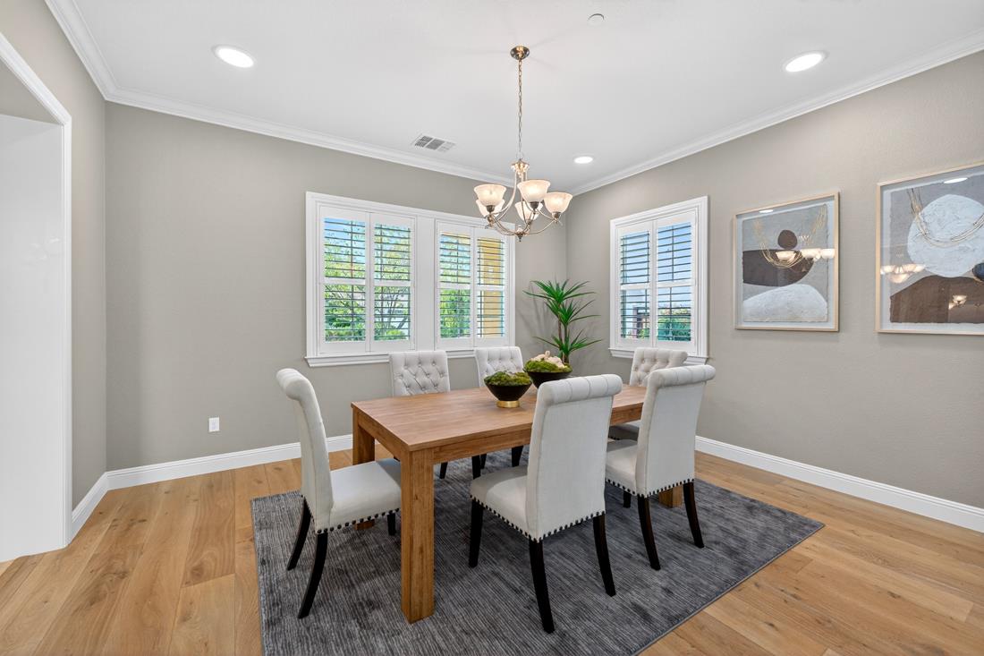 718 Timberpine Avenue Sunnyvale, CA 94086 - Photo 7 of 71 a dining room with furniture a chandelier and wooden floor