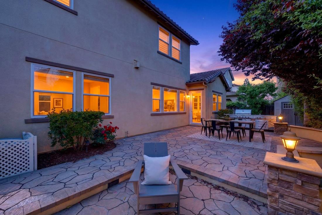 718 Timberpine Avenue Sunnyvale, CA 94086 - Photo 71 of 71 a view of a patio with table and chairs potted plants and a large tree