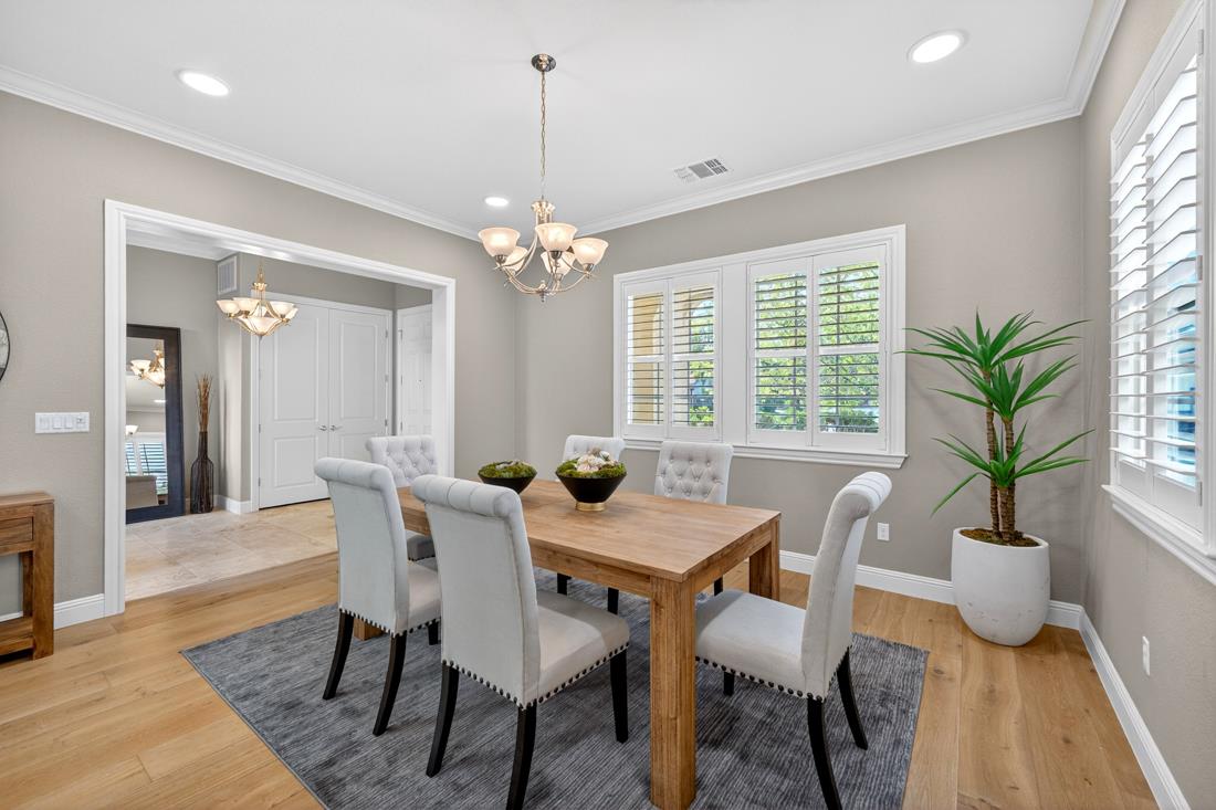 718 Timberpine Avenue Sunnyvale, CA 94086 - Photo 8 of 71 a dining room with furniture a chandelier and wooden floor