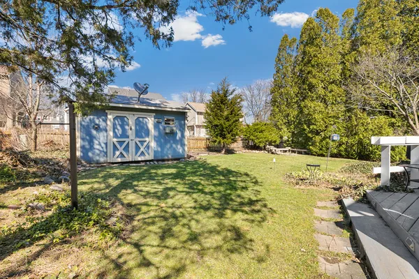 a view of outdoor space with garden and patio