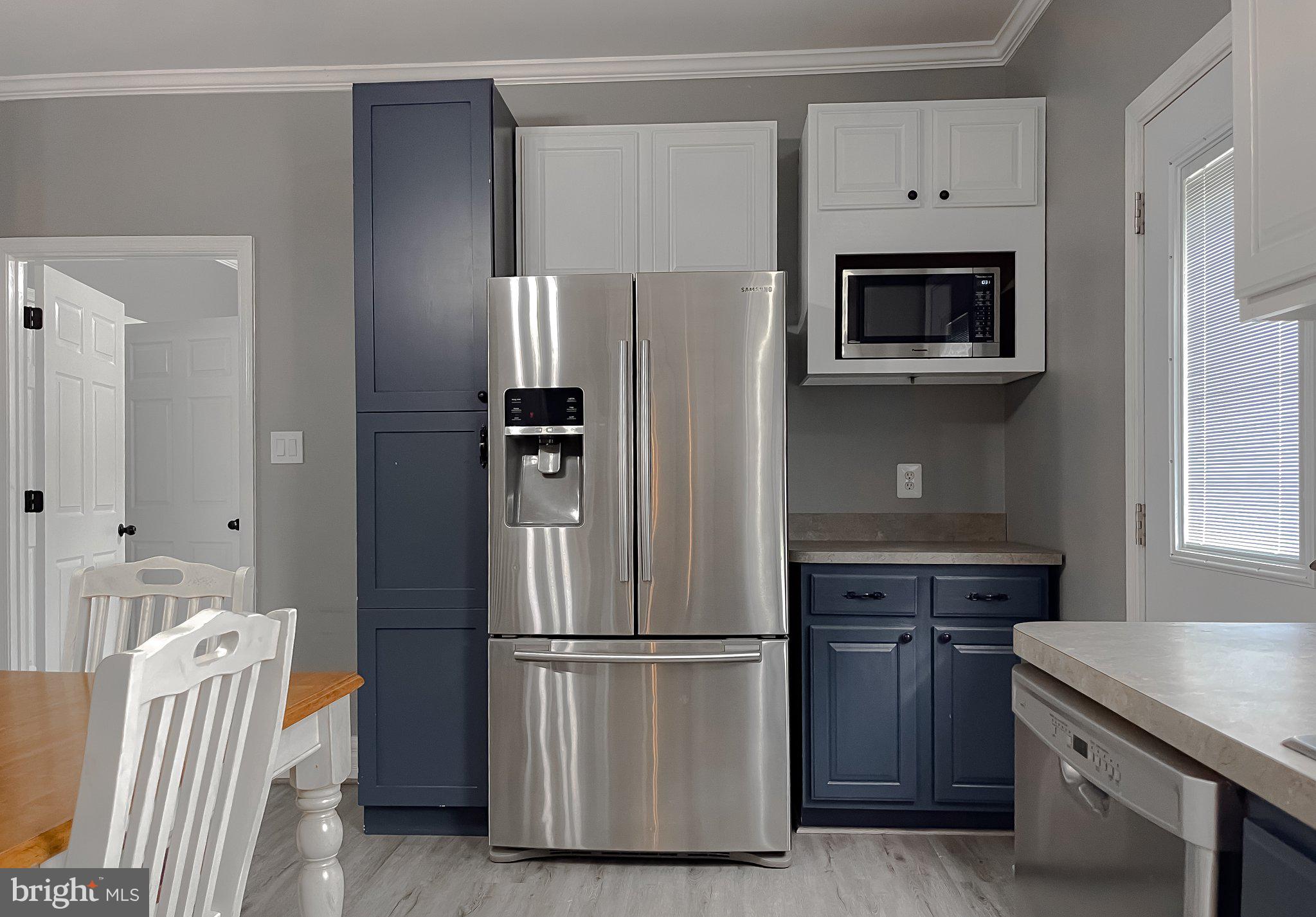 400 Adelina Road Prince Frederick, MD 20678 - Photo 38 of 57 Modern kitchen with sleek appliances.