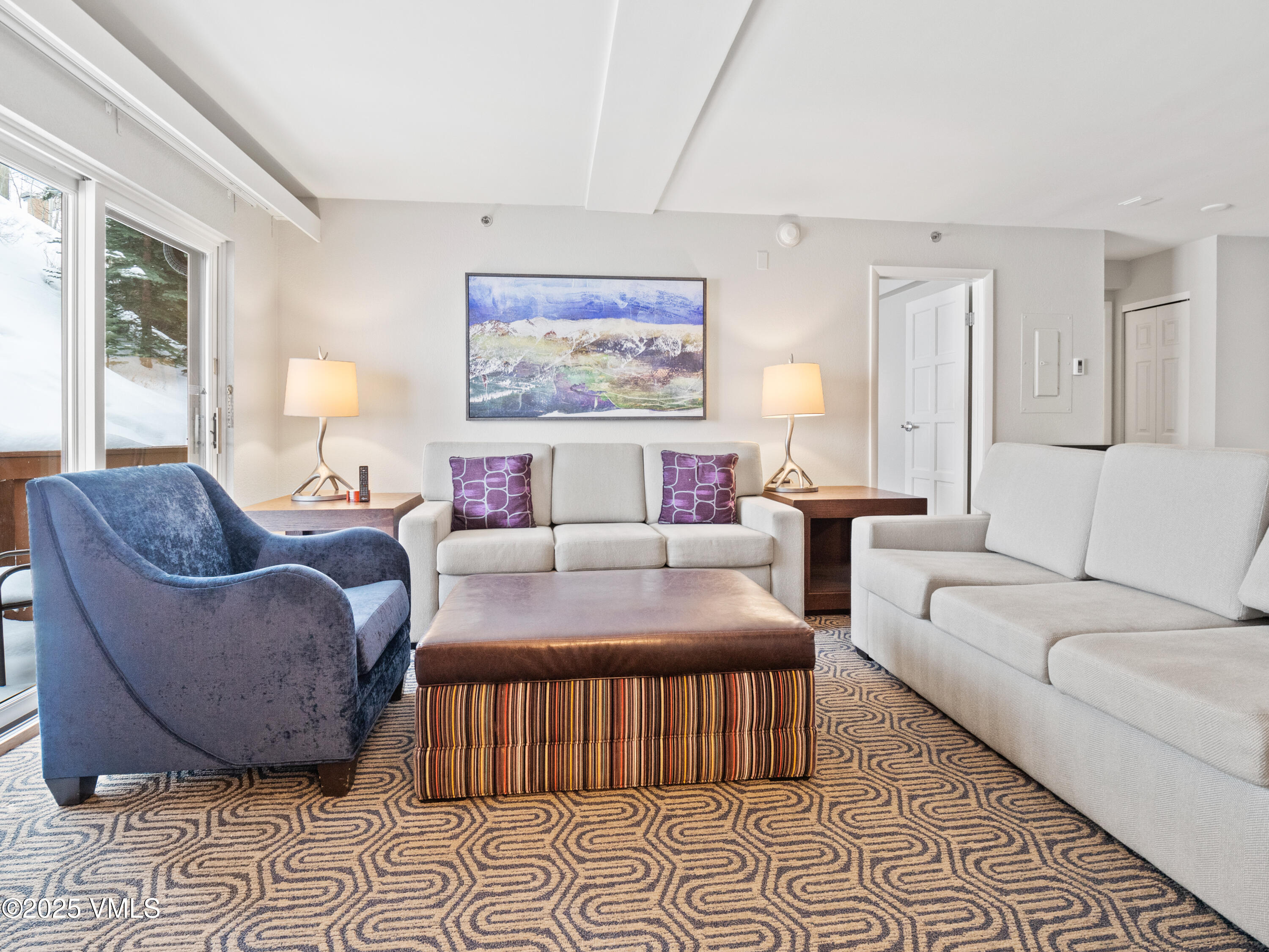 2254 South Frontage Road West, Unit 106/WEEK 51 Vail, CO 81657 - Photo 1 of 15 a living room with furniture and a rug