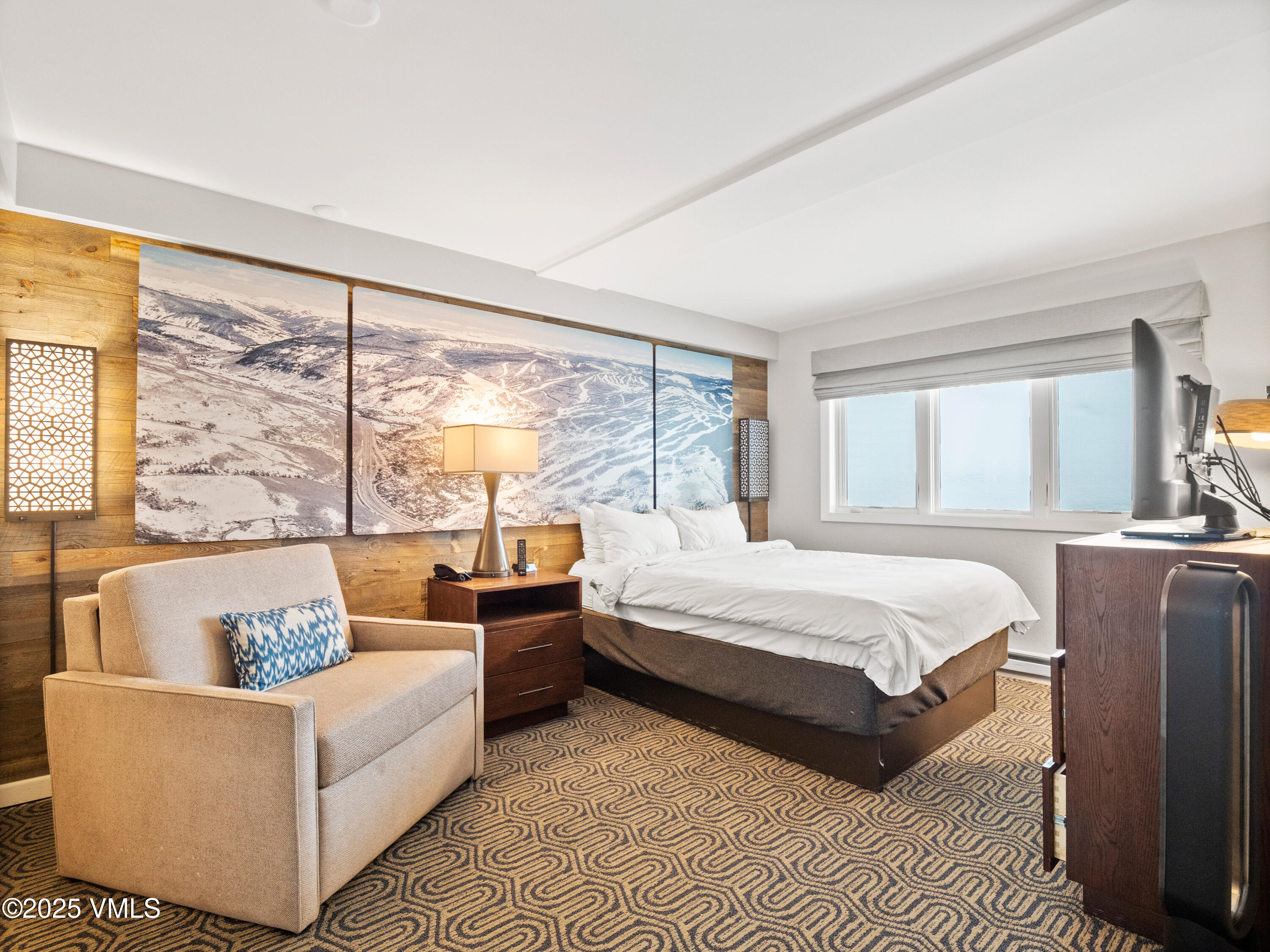 2254 South Frontage Road West, Unit 106/WEEK 51 Vail, CO 81657 - Photo 4 of 15 a spacious bedroom with a large bed couch and a large window