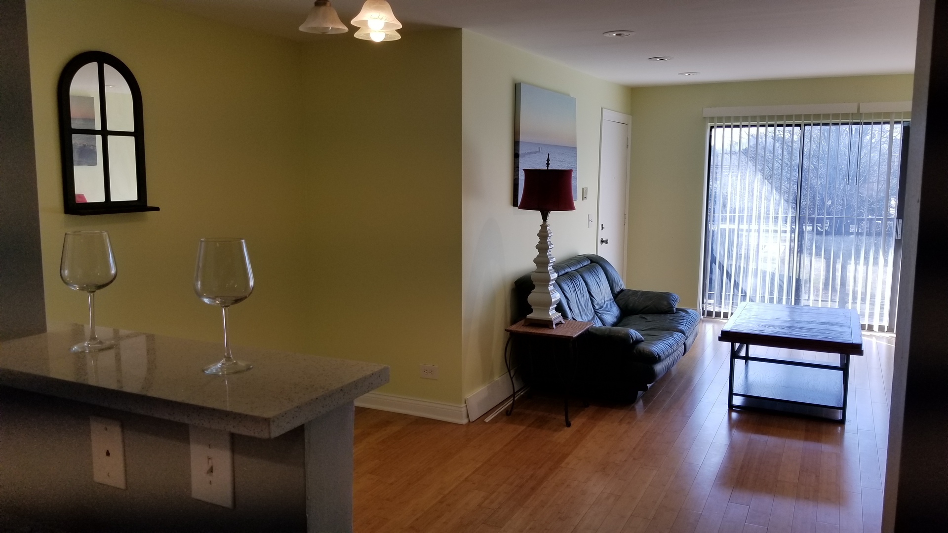 406 East Kensington Road, Unit C Mount Prospect, IL 60056 - Photo 11 of 22 a living room with furniture and a window