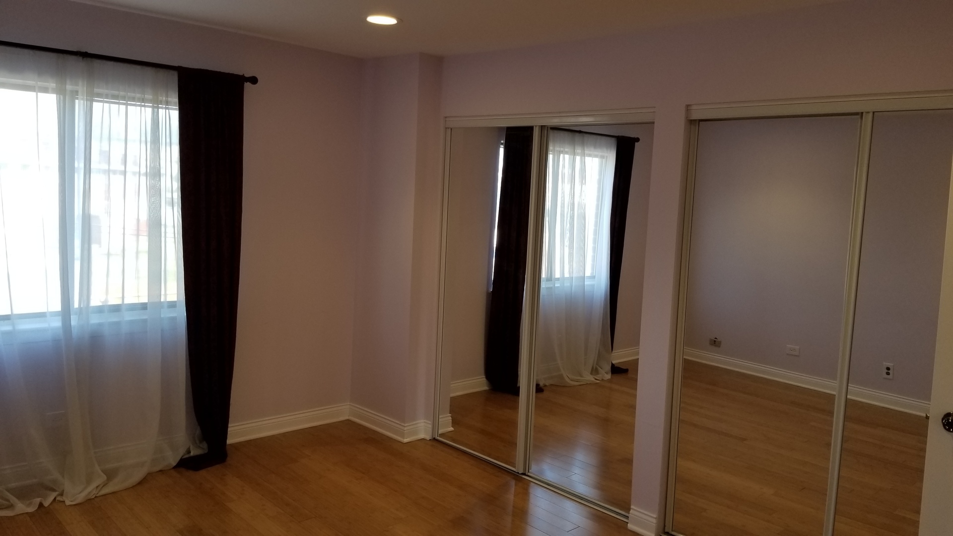 406 East Kensington Road, Unit C Mount Prospect, IL 60056 - Photo 21 of 22 an empty room with closet