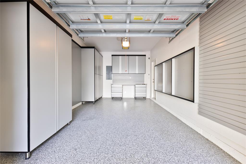 122 Southwest 7th Court, Unit 122 Pompano Beach, FL 33060 - Photo 16 of 36 a view of a hallway with a dining table and chairs