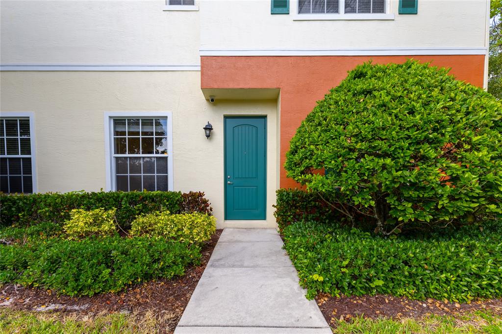 122 Southwest 7th Court, Unit 122 Pompano Beach, FL 33060 - Photo 32 of 36 a view of a pathway along the building