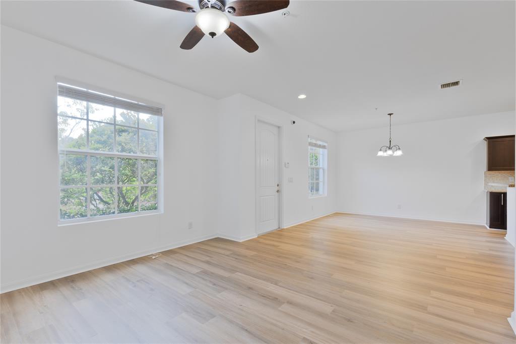 122 Southwest 7th Court, Unit 122 Pompano Beach, FL 33060 - Photo 7 of 36 a view of an empty room with a window