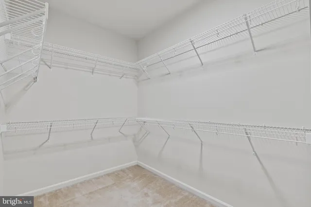 a view of a room with racks on the wall