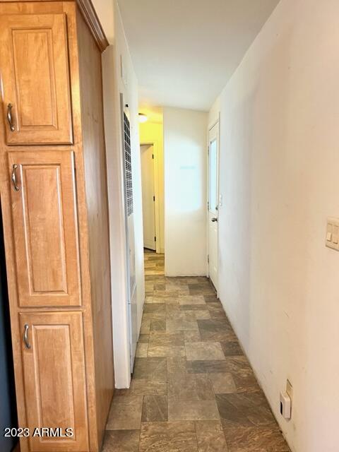701 South Dobson Road, Unit 4 Mesa, AZ 85202 - Photo 8 of 37 PANTRY AND HALLWAY TO BEDROOMS BATHROOM