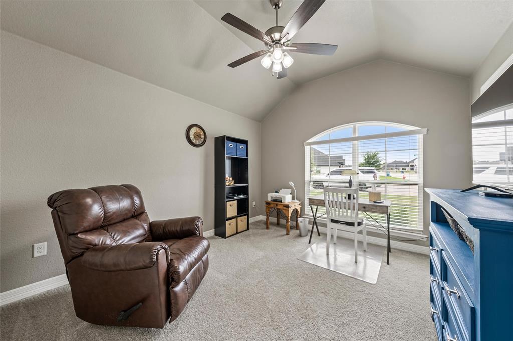 828 Agile Street Hewitt, TX 76643 - Photo 17 of 30 a living room with furniture and a large window