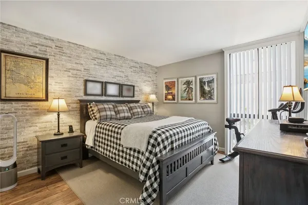 a bed room with a bed and a couch