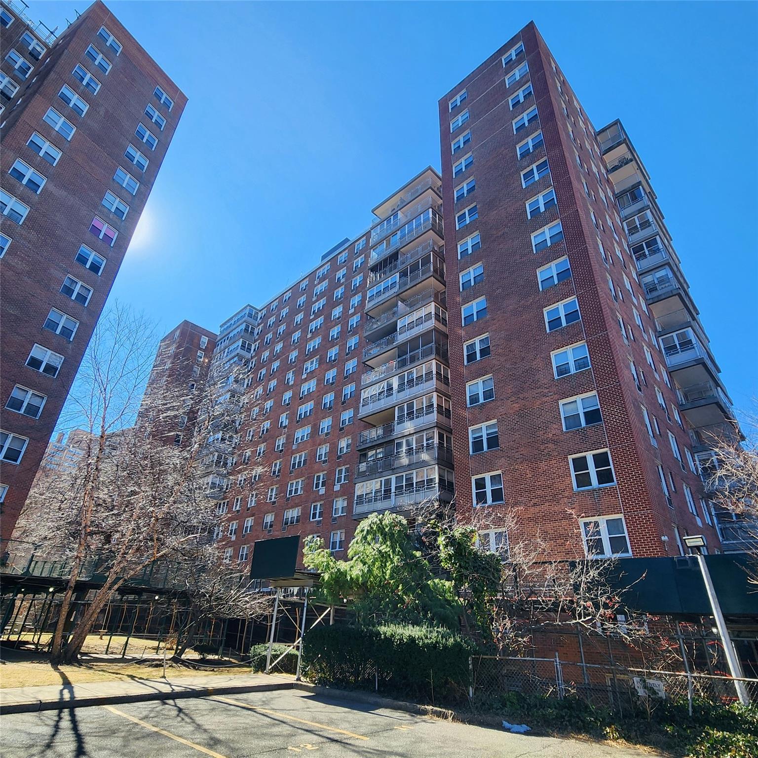 138-10 Franklin Avenue, Unit 7D Queens, NY 11355 - Photo 1 of 15 View of property featuring fence