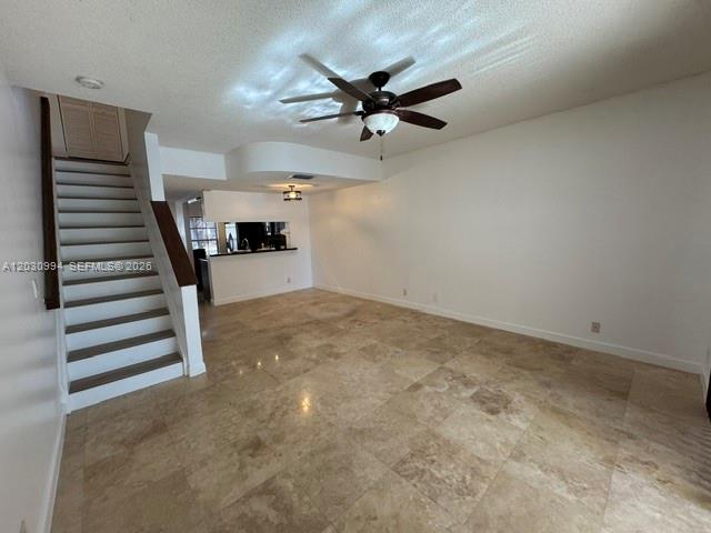 192 Southwest 96th Avenue, Unit 192 Plantation, FL 33324 - Photo 4 of 15 a view of wooden floor and a ceiling fan in a room