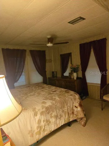 a bathroom with a double vanity sink and mirror