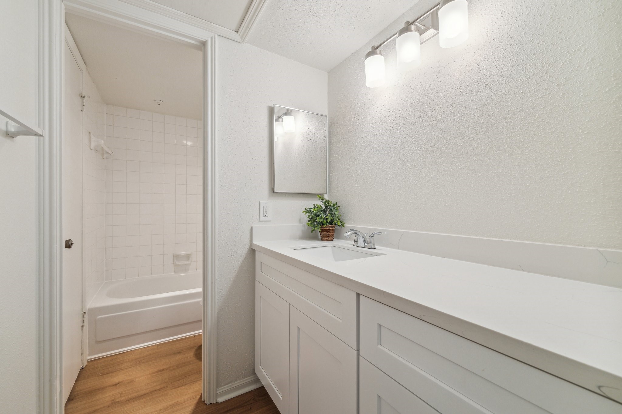 2100 Tanglewilde Street, Unit 514 Houston, TX 77063 - Photo 10 of 22 a bathroom with a sink and a mirror